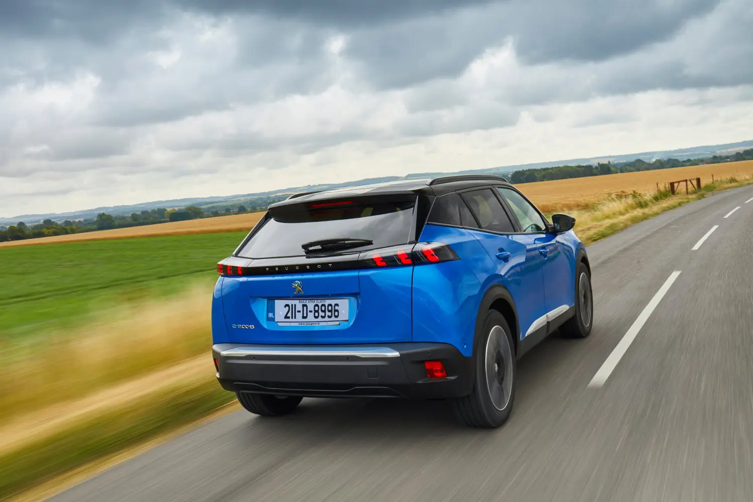 This is a photo of the rear of the Peugeot e2008, the colour is Vertigo Blue.