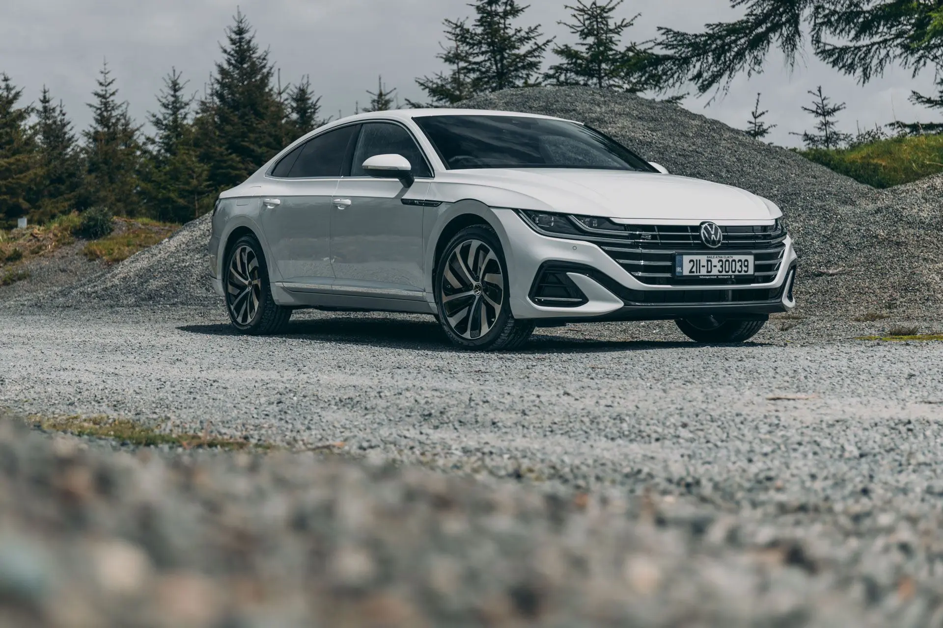 A photo of a white Volkswagen Arteon PHEV eHybrid.