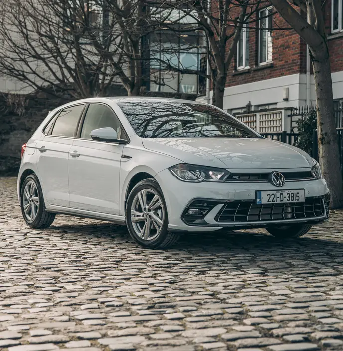 A white Volkswagen Polo