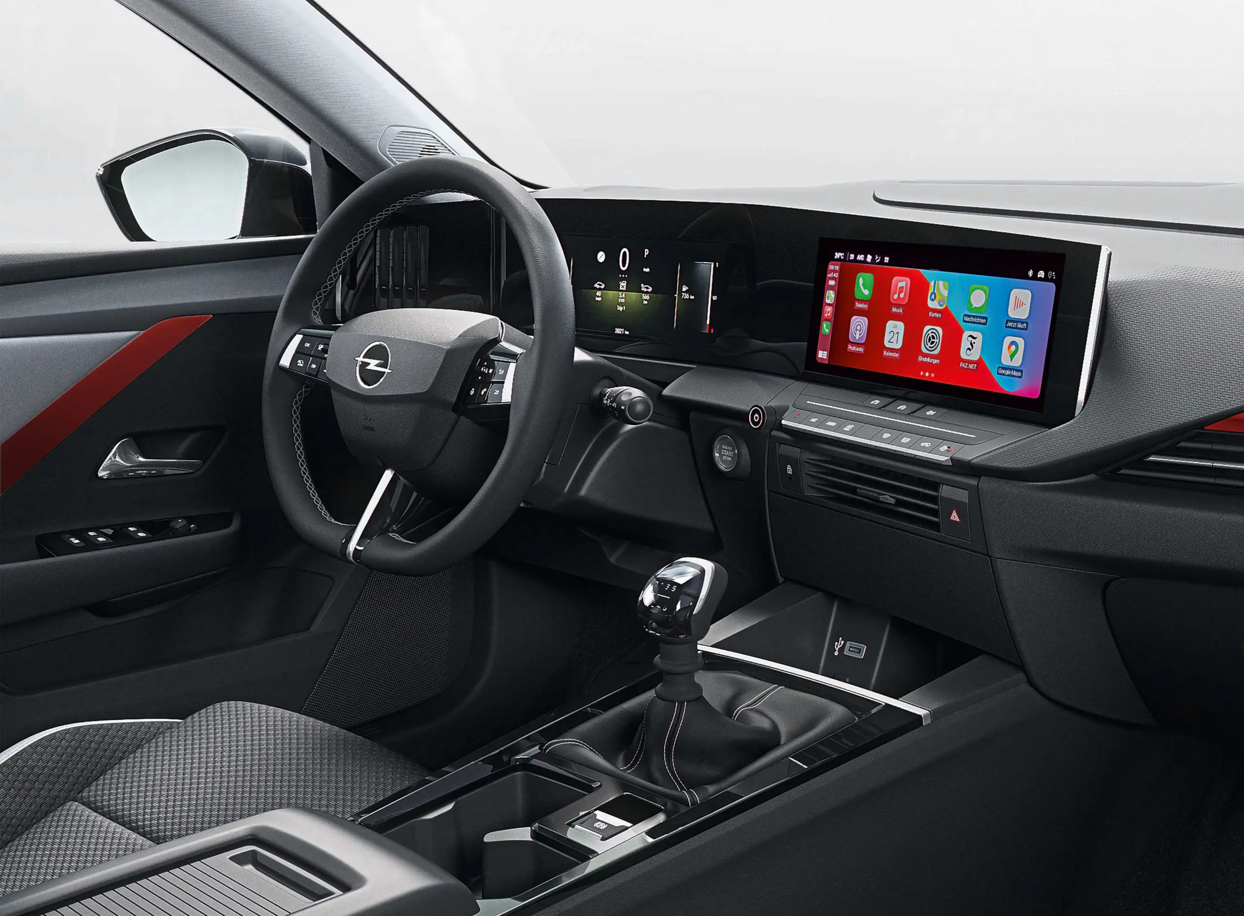 The interior of a red Opel Astra