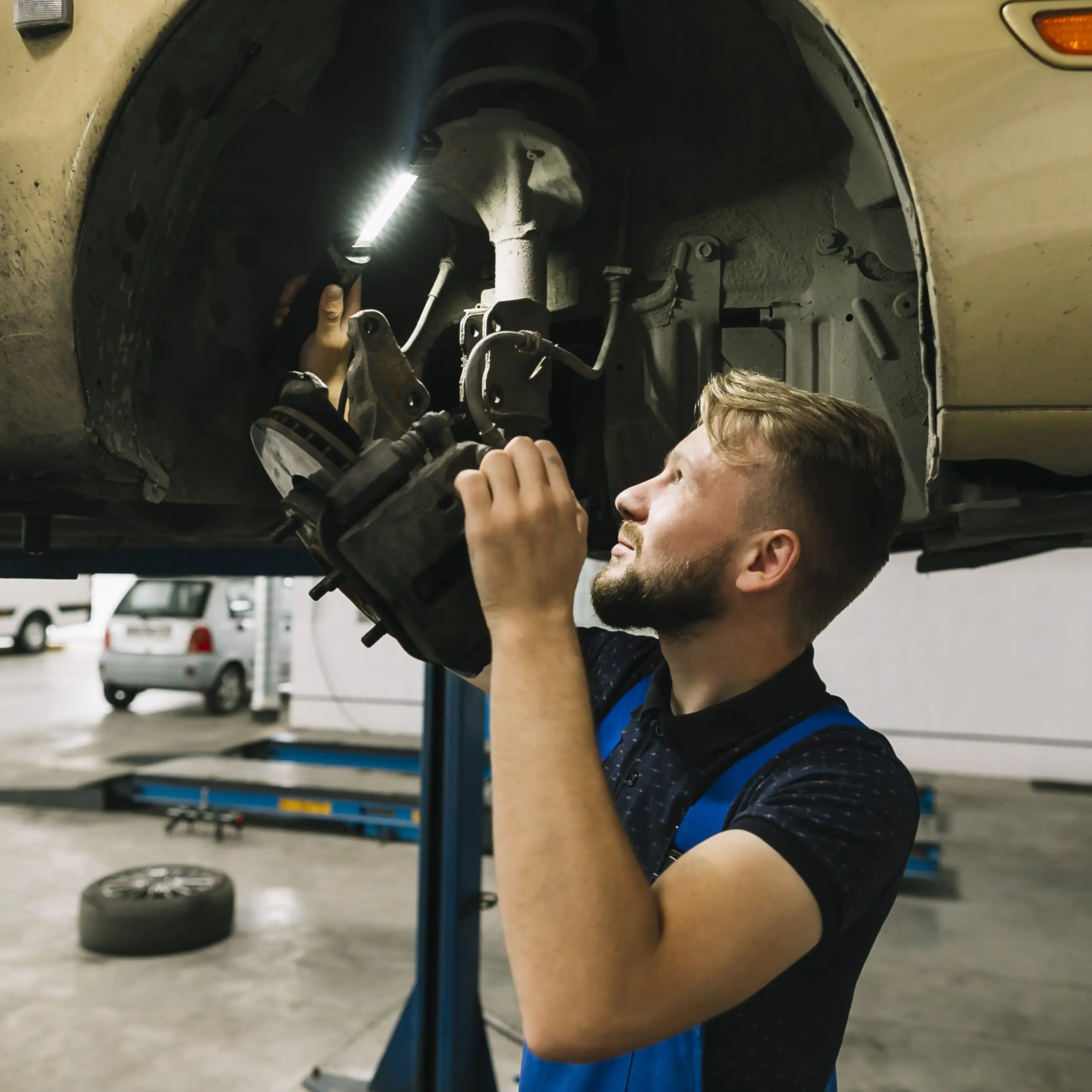 man servicing car at AA Approved Car Service Centre, car service, car service near me, car service dublin, oil change service, tyre change service near me
