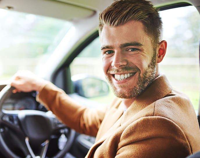 AA Approved Cars - New car owner sitting behind the wheel